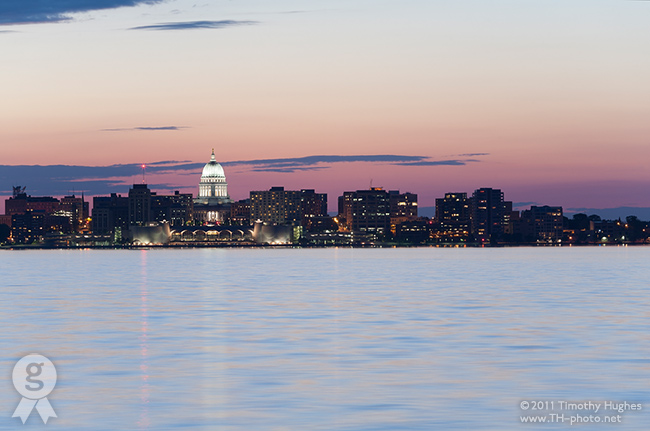 Sunset over Madison, Wisconsin. A cityscape with Lake Mendota, Wisconsin State Capitol and Monona Terrace.
