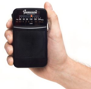 Studio product photo of radio being held