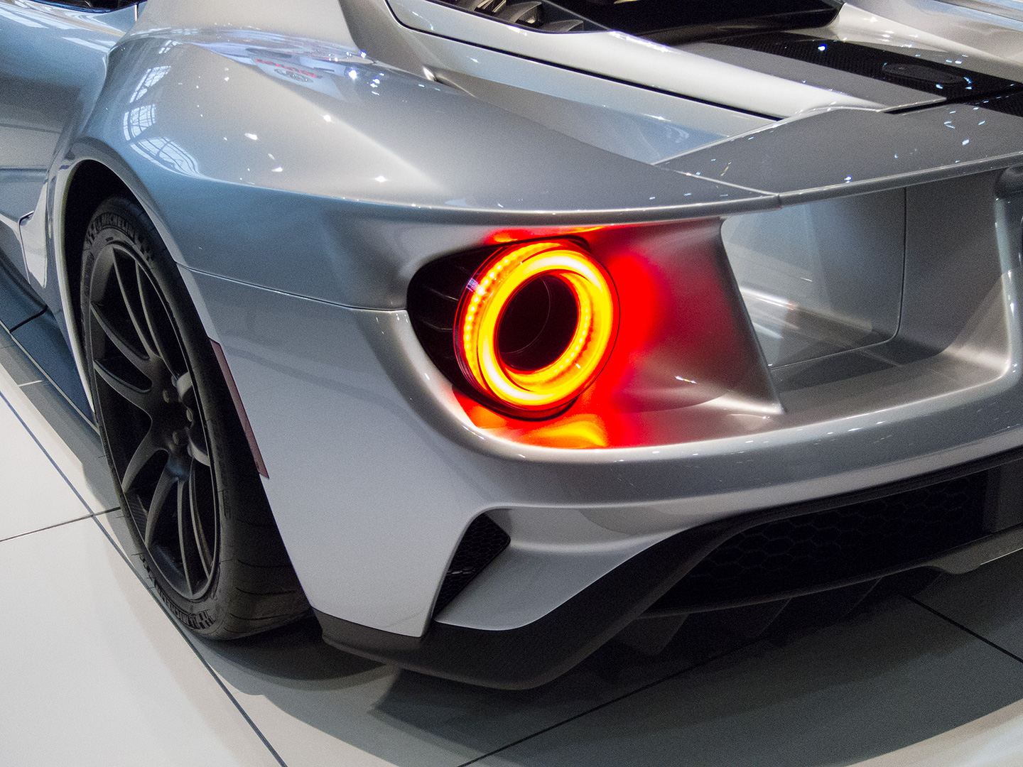 Taillights of a silver Ford GT