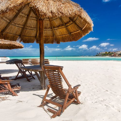 Chairs on a quiet beach resort on the ocean