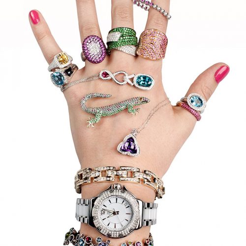 Female hand model jewelry advertisement, white background in photo studio