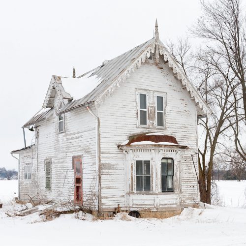 Old, gothic farmhouse in winter