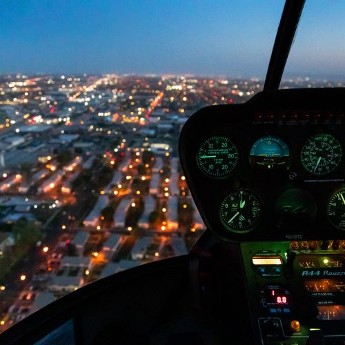 Helicopter cockpit photograph at twilight