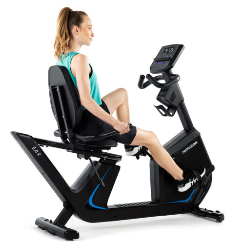 Fitness equipment: studio photo of model on recumbent bike